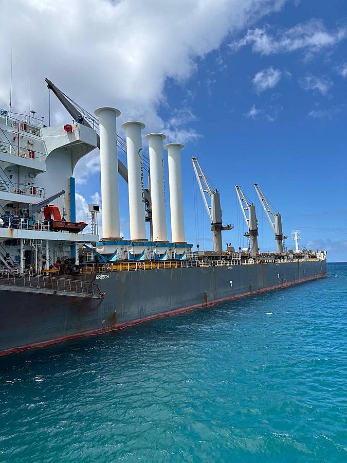 A Wind-Powered Mineral Carrier Docks in New Caledonia